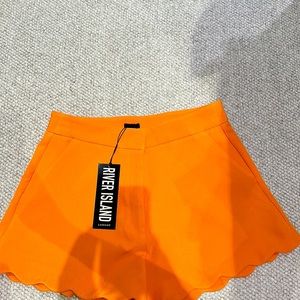 River Island Orange scalloped shorts in size US 6 . Tag on! Brand new